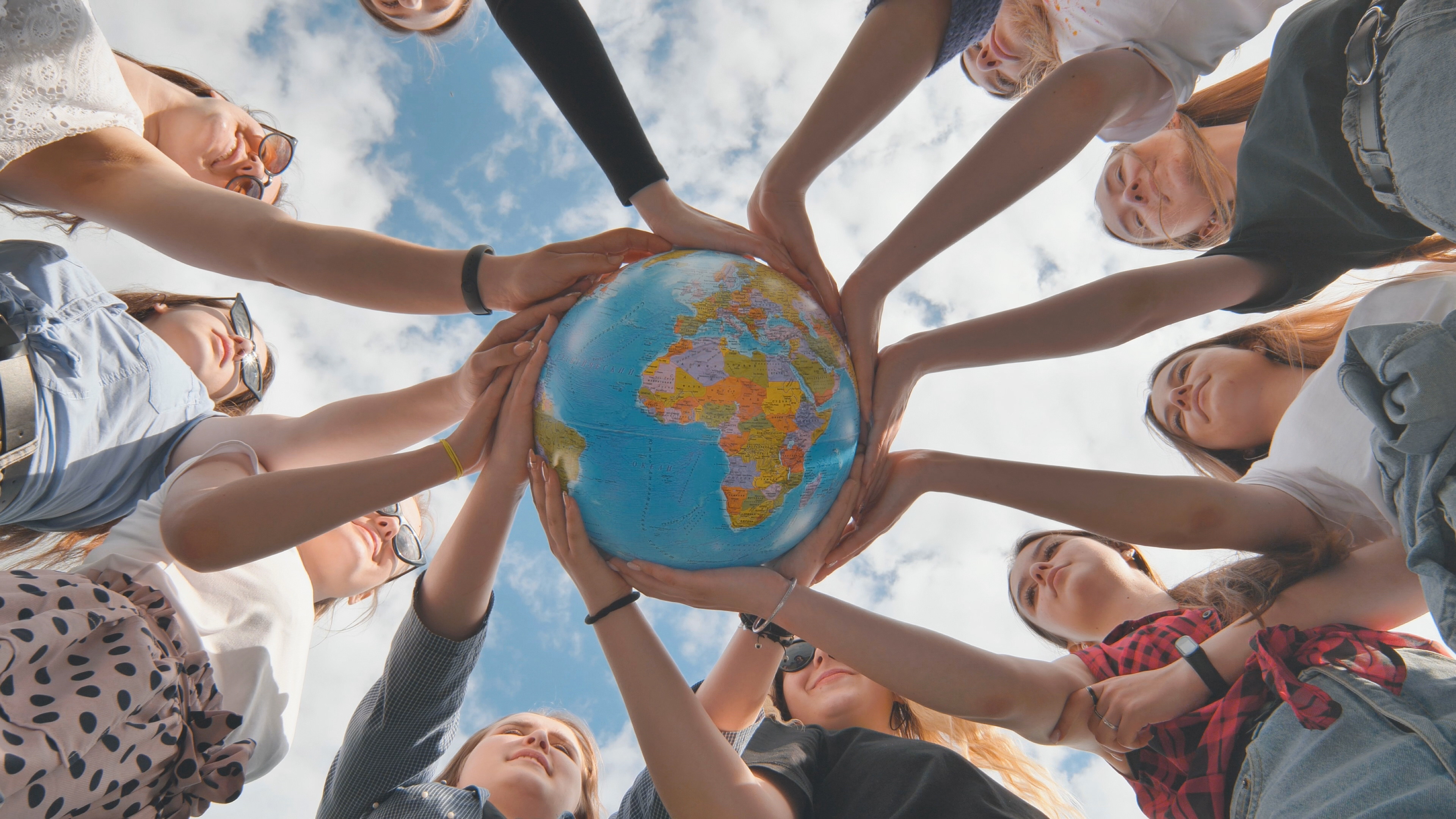 Children holding the Earth