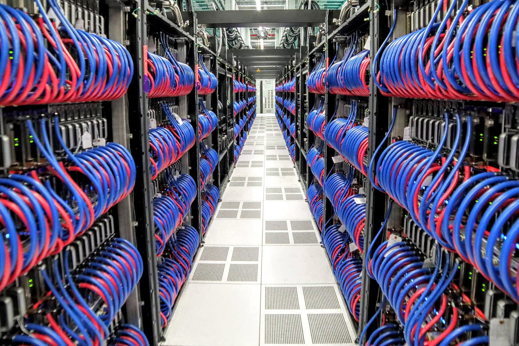 Inside the Frontier supercomputer, a network of tubes carries water to cool thousands of computer chips in the system.