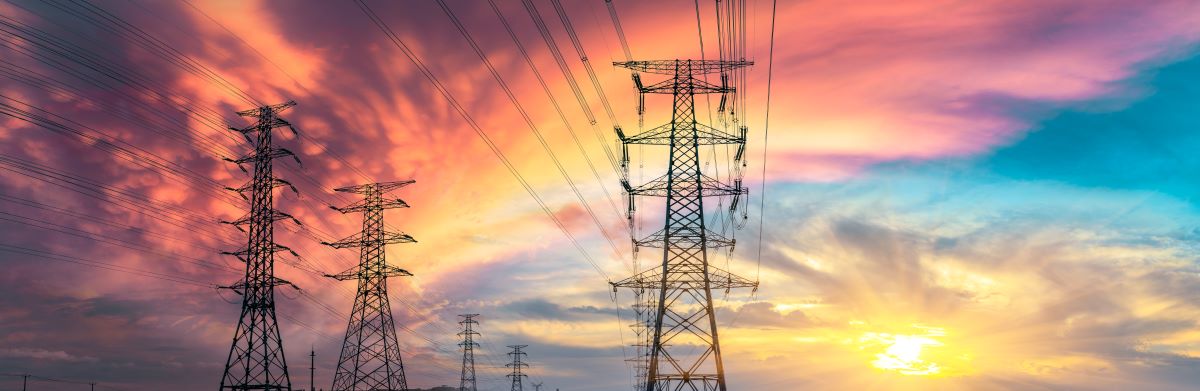 Electric transmission lines at sunset