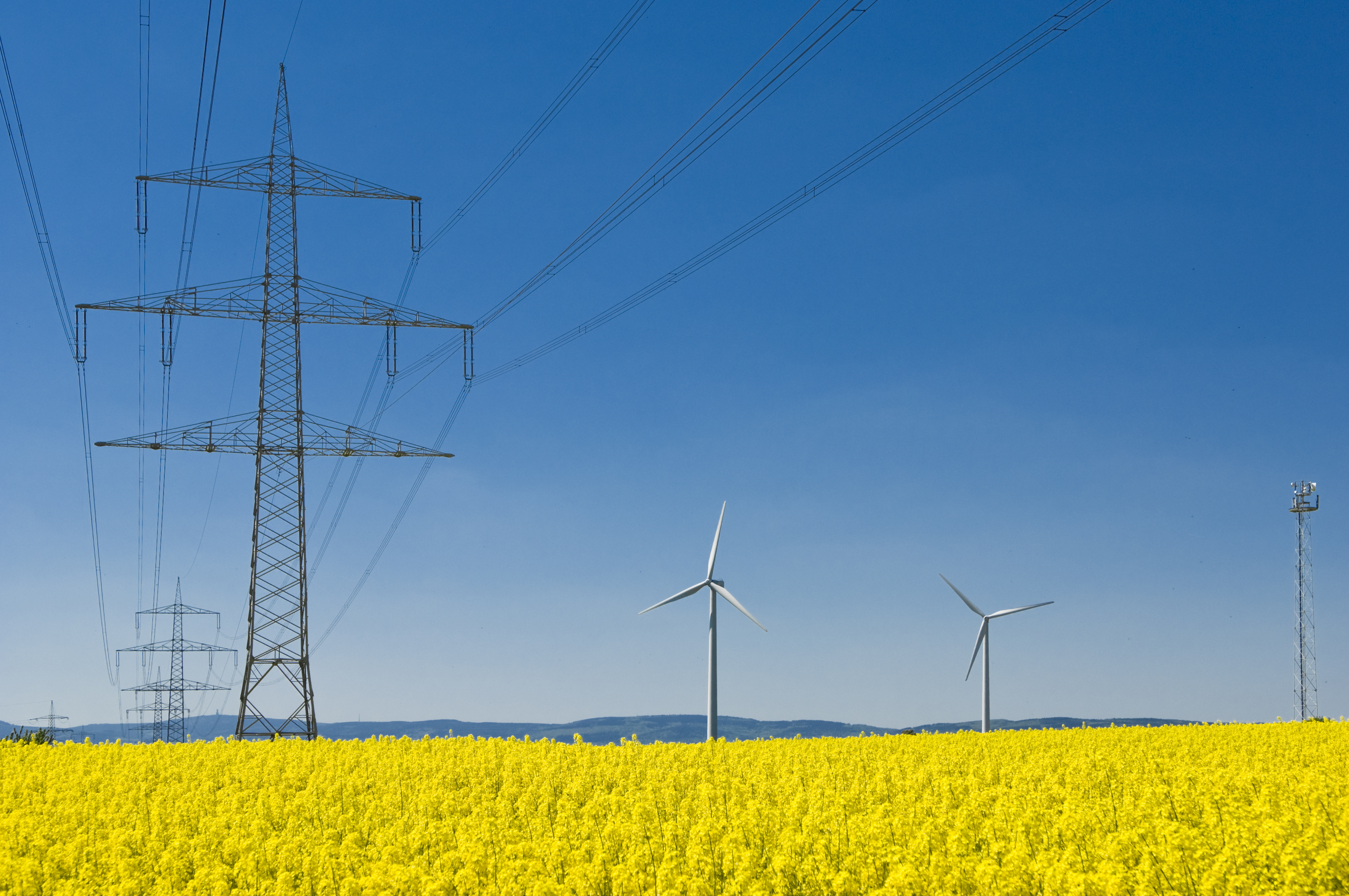 Electric Grid and Wind Turbines in a rural area. 