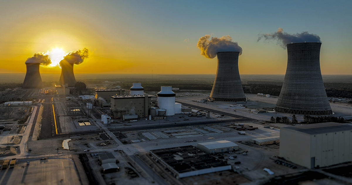 Sun setting behind nuclear power plant in Georgia