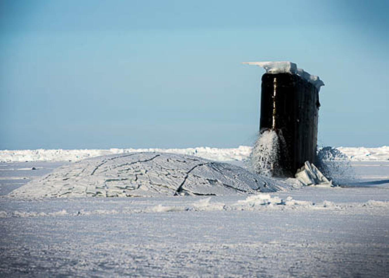 Submarine breaking through ice