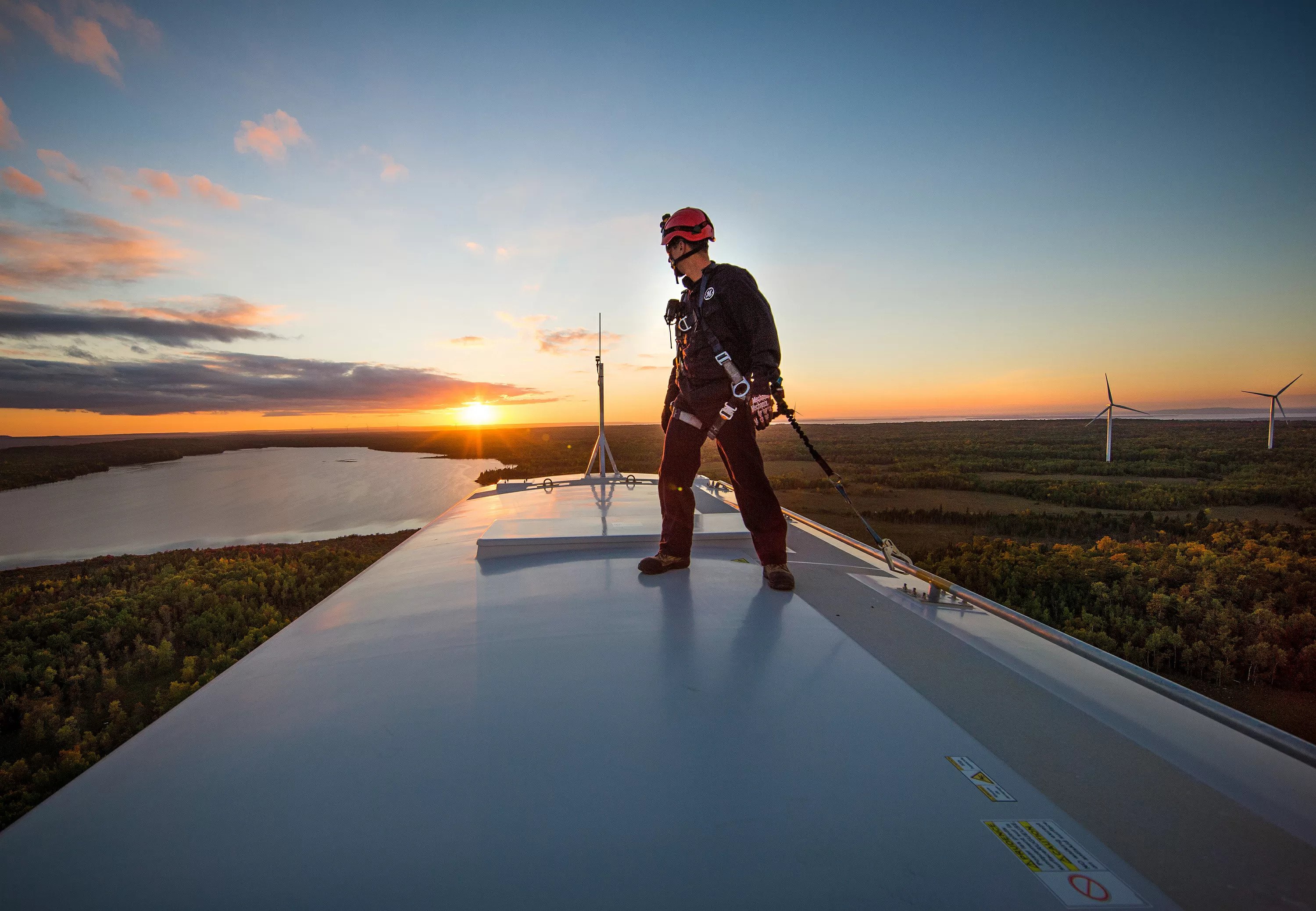 Land-Based Wind Turbine with man-on-mcleans mountain canada