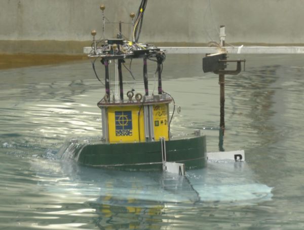 Marine energy device in an indoor facility going through testing. 