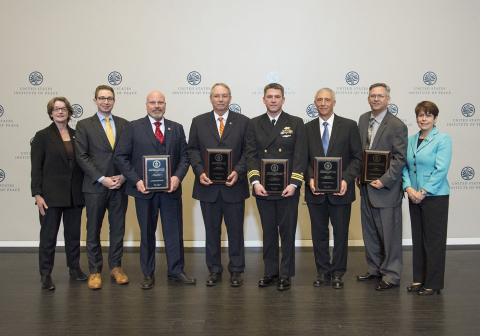 DOE officials presented a 2018 Federal Energy and Water Management Award to the U.S. Marine Corps Recruit Depot Parris Island team.