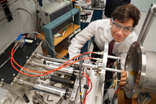 Summer intern Jaime Avilés Acosta studies materials for an ultra-fast particle detector. The technology could also have applications outside of physics research, from detecting radioactive materials to improved night-vision goggles.