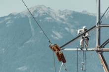 Man on power line Western Area Power Administration (WAPA)