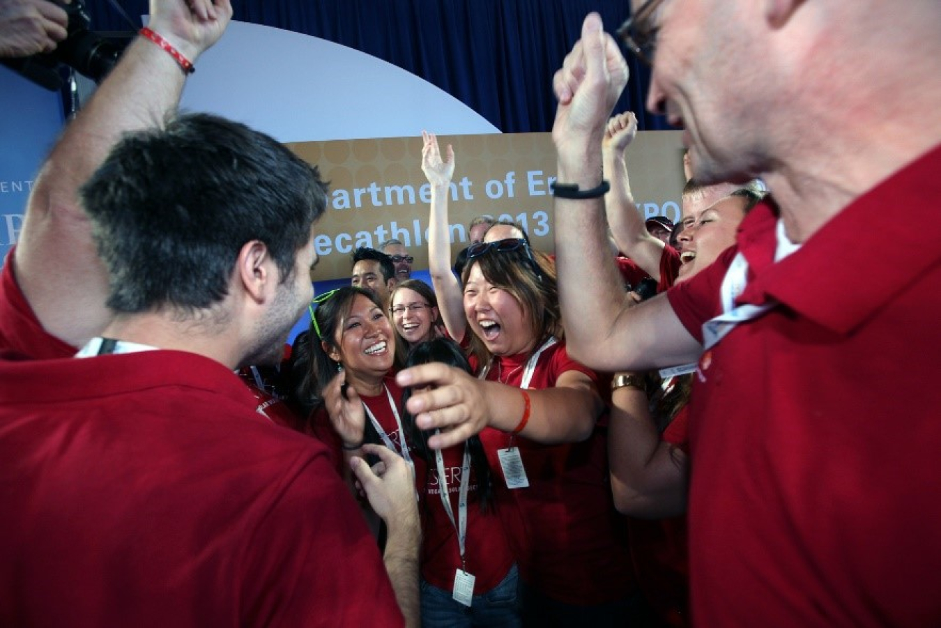 Students celebrate and smile after winning the Solar Decathlon