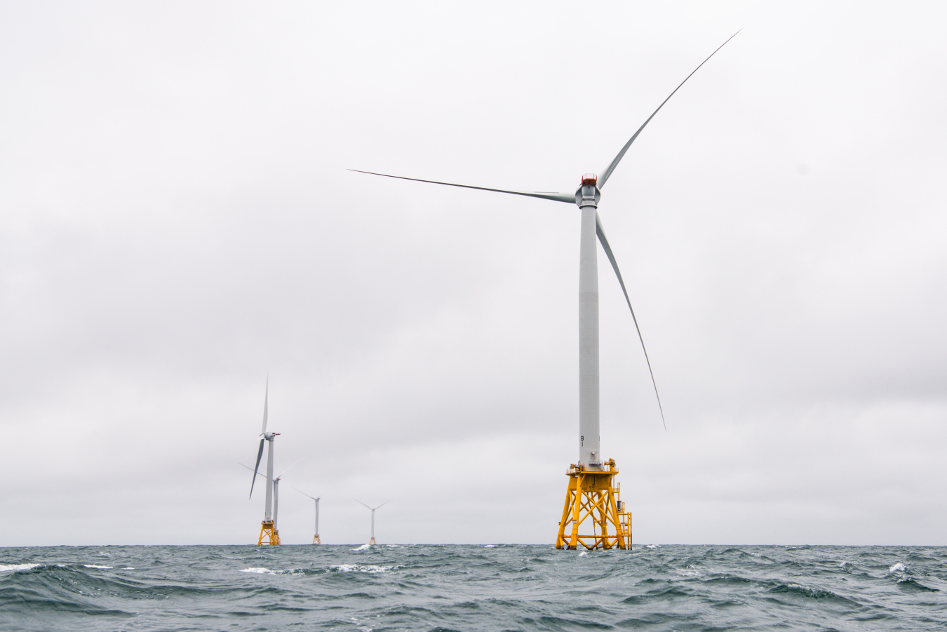 Offshore wind turbines in heavy seas.