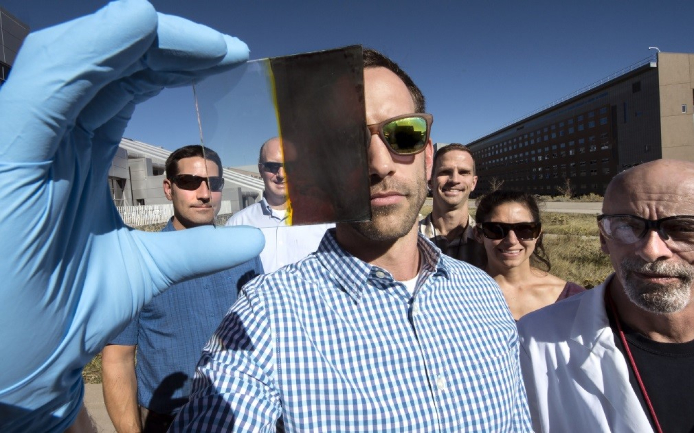 NREL researchers developed a switchable photovoltaic window that splits between transparent and opaque states.