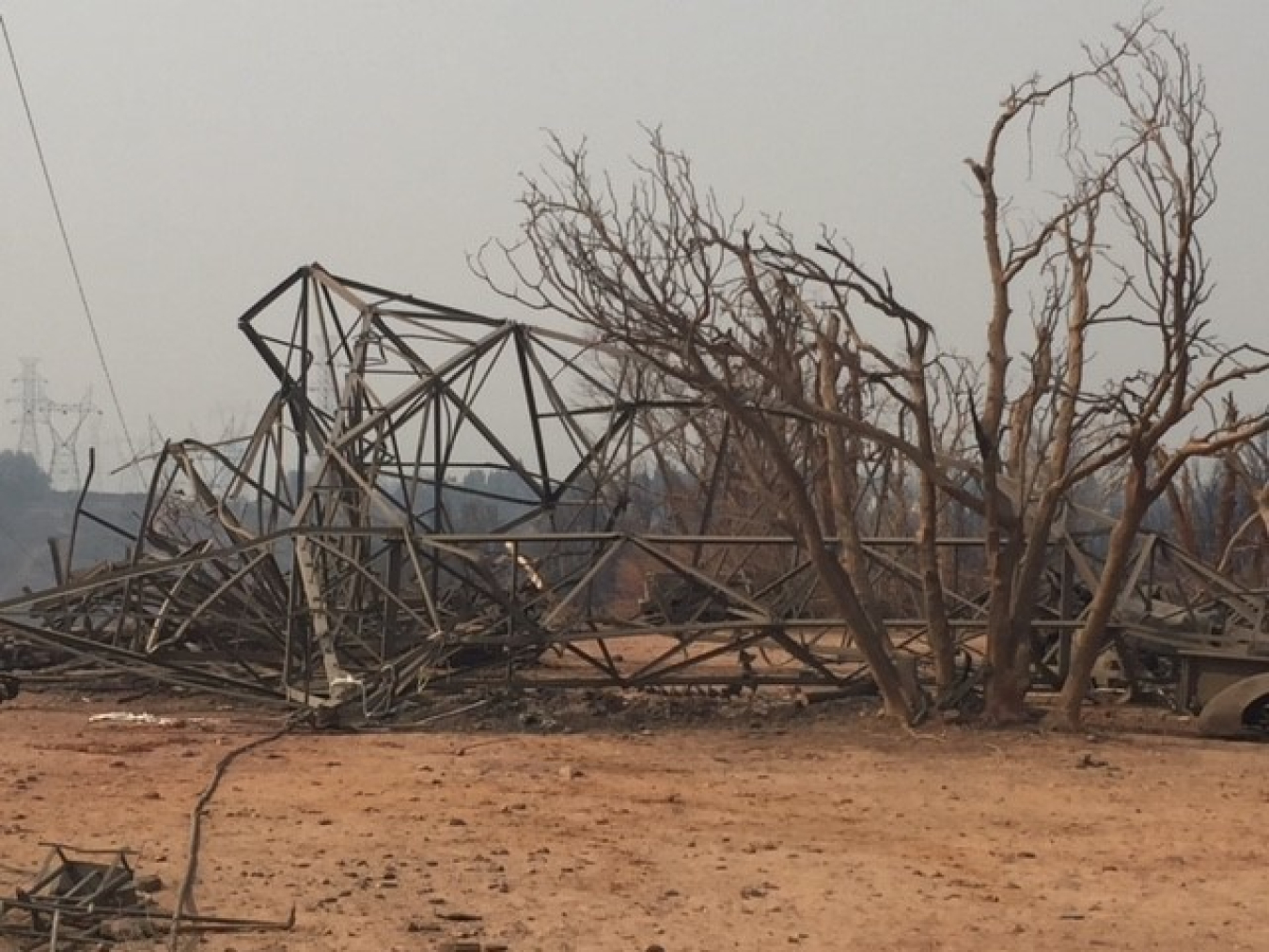 Picture of transmission tower brought down by the fire