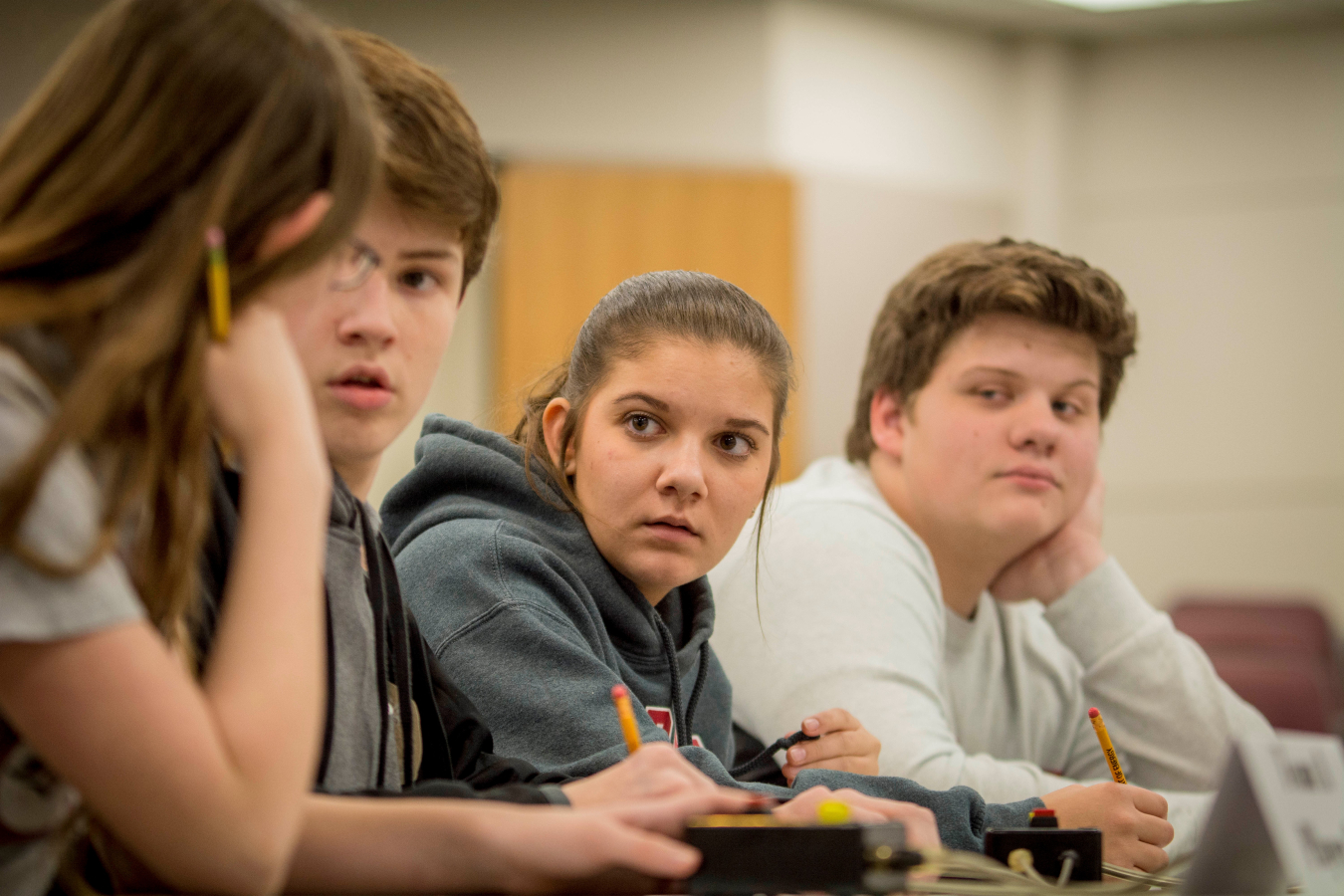 McCracken County High School students Evie Dukes, Mason Wooten, Ella McBee and Jake Mitchell compete in a quick-recall, fast-paced question-and-answer contest at this year’s DOE Regional Science Bowl. 