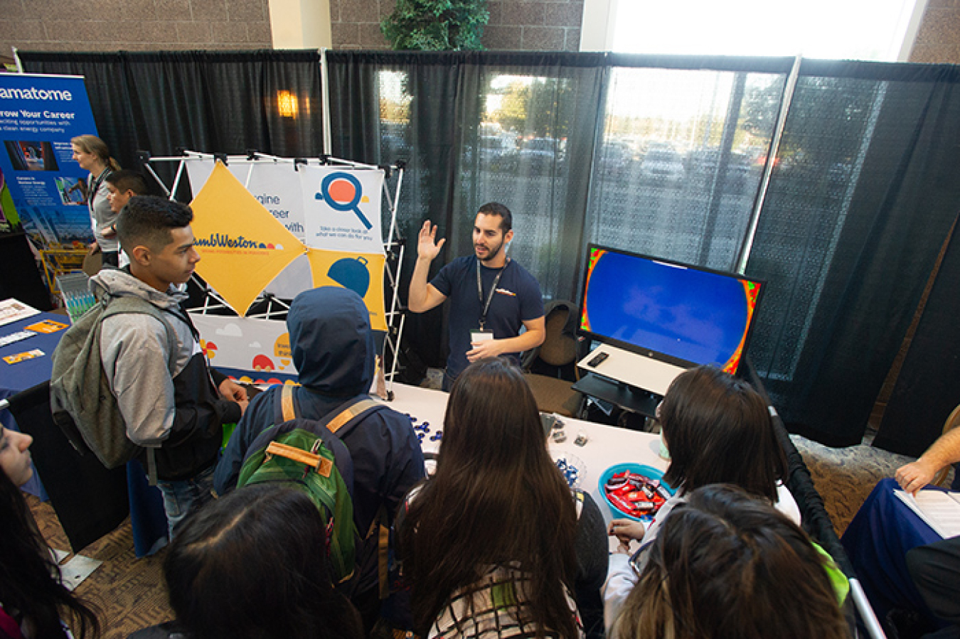 Attendees at the second annual Connect Tri-Cities event listen to the job opportunities available at one local company. More than 1,000 local high school students and job seekers attended the event where they were able to learn about potential jobs.