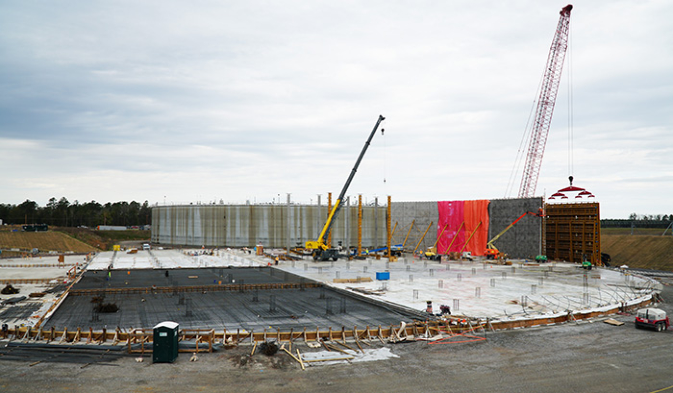 A photo from March 2019 shows progress to the Saltstone Disposal Unit (SDU) 7 outer shell construction. SDU 6 is in the background. 