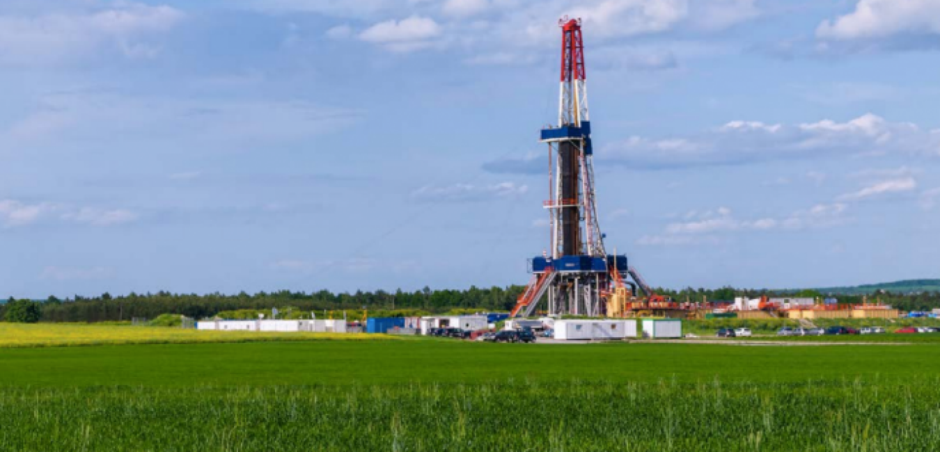 Fracking equipment in a field at daytime.