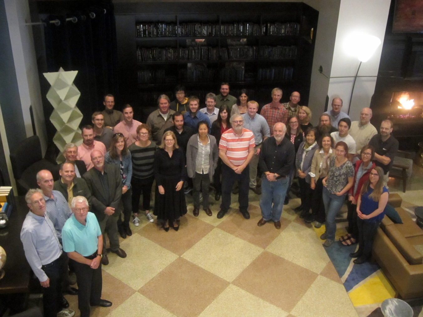 At the Center for Biological Electron Transfer and Catalysis, John Peters (front row, second person on the left), Natasha Pence (far right) and a diverse team learn how electron transfer processes drive energy-intense reactions.