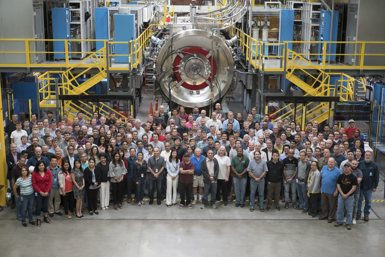 Norman w/ the TAE Technologies team in the foreground for scale. The project is the world’s largest private fusion effort, with more than 160 scientists representing 35 countries. Seen here is one of two identical outer diverters on either side of Norman.