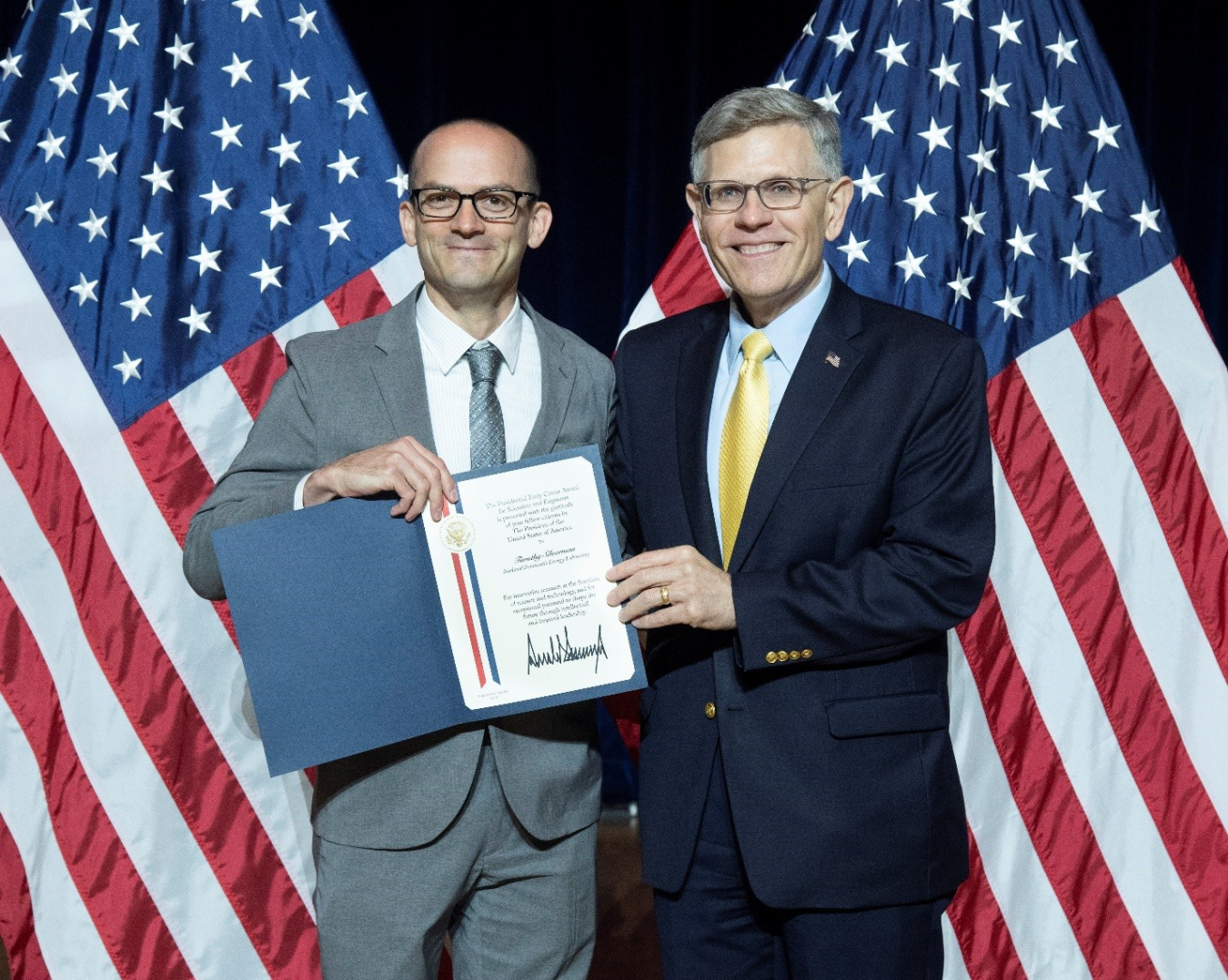 Timothy Silverman with Kelvin K. Droegemeier