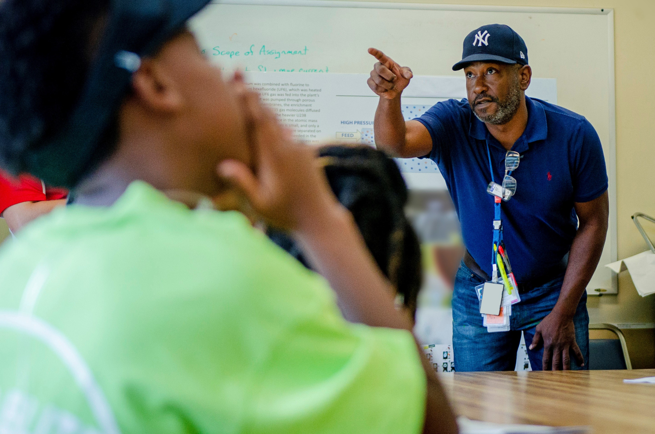 FRNP Facility Operations Manager Kent Leggs teaches Boys and Girls Club members about uranium enrichment operations that were performed at the plant from 1952-2013.