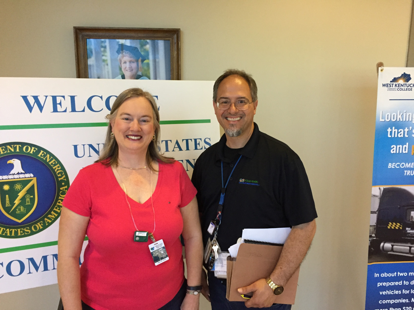 Amy Shumate pauses for a photograph with Four Rivers Nuclear Partnership Senior Community Relations Specialist and DOE community tour coordinator Steve Christmas before a recent tour.  