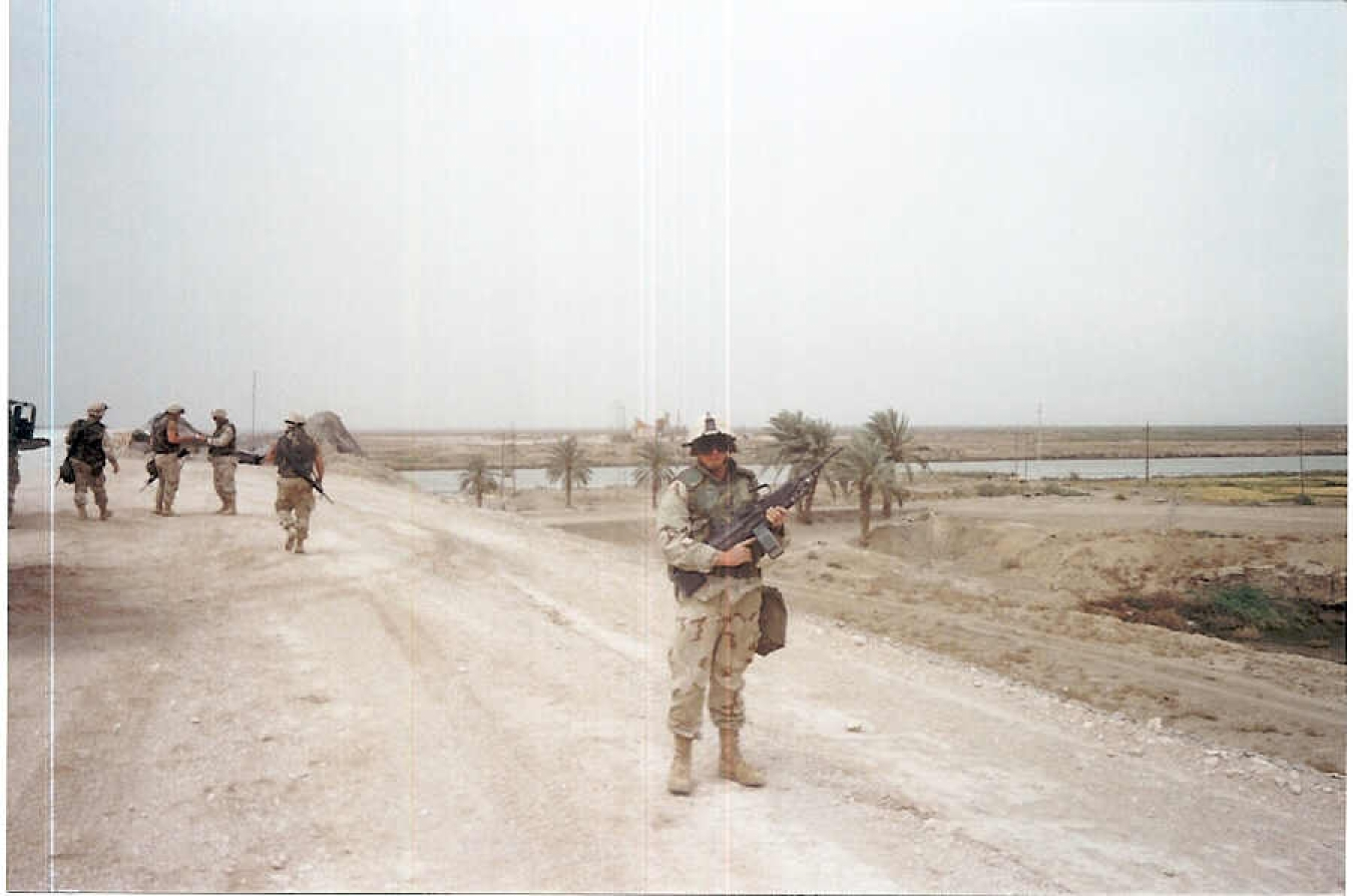 Henry Becker at the Euphrates River near An Nassiryah, Iraq, in 2003.