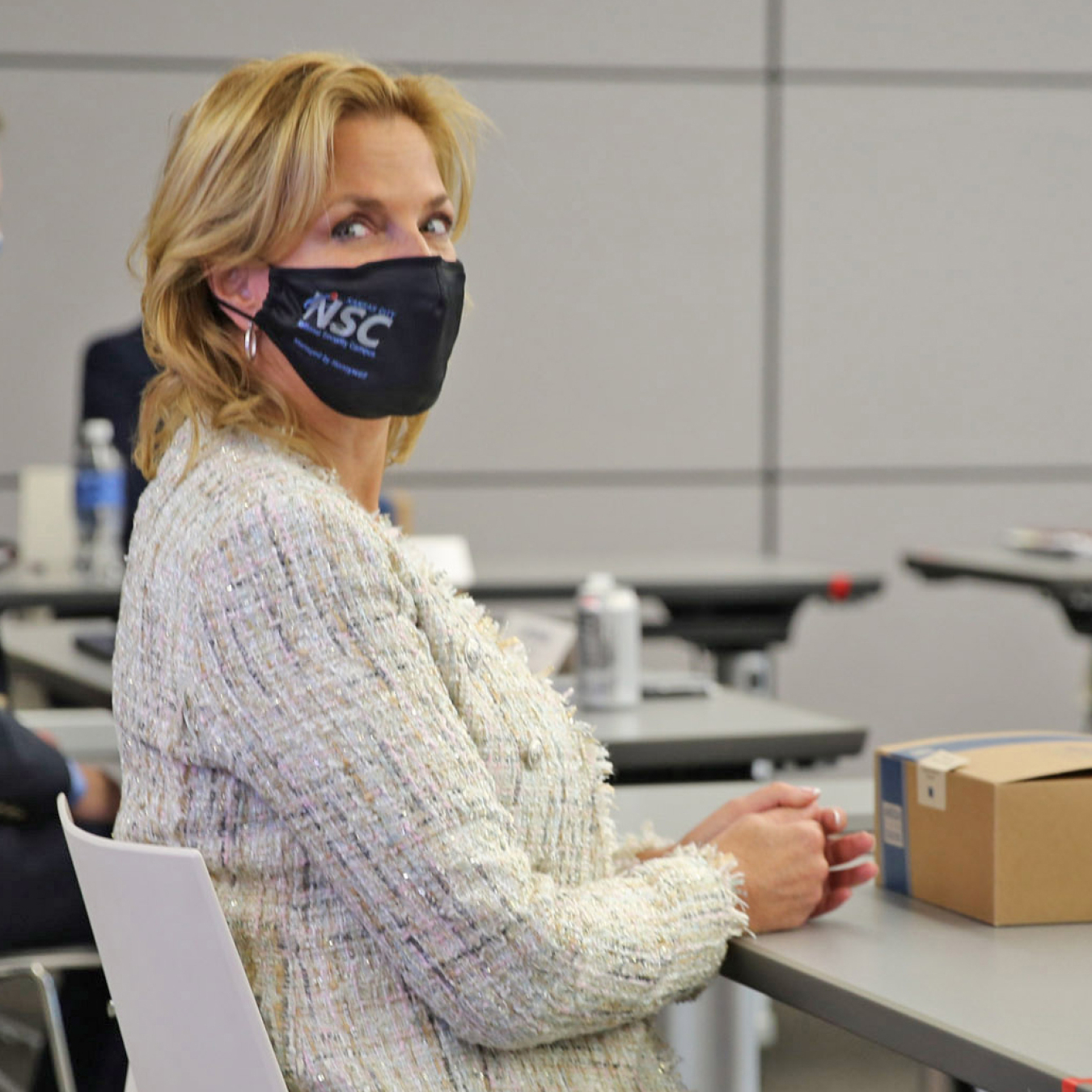 NNSA Administrator Lisa E. Gordon-Hagerty listens to a manager from Kansas City National Security Campus.