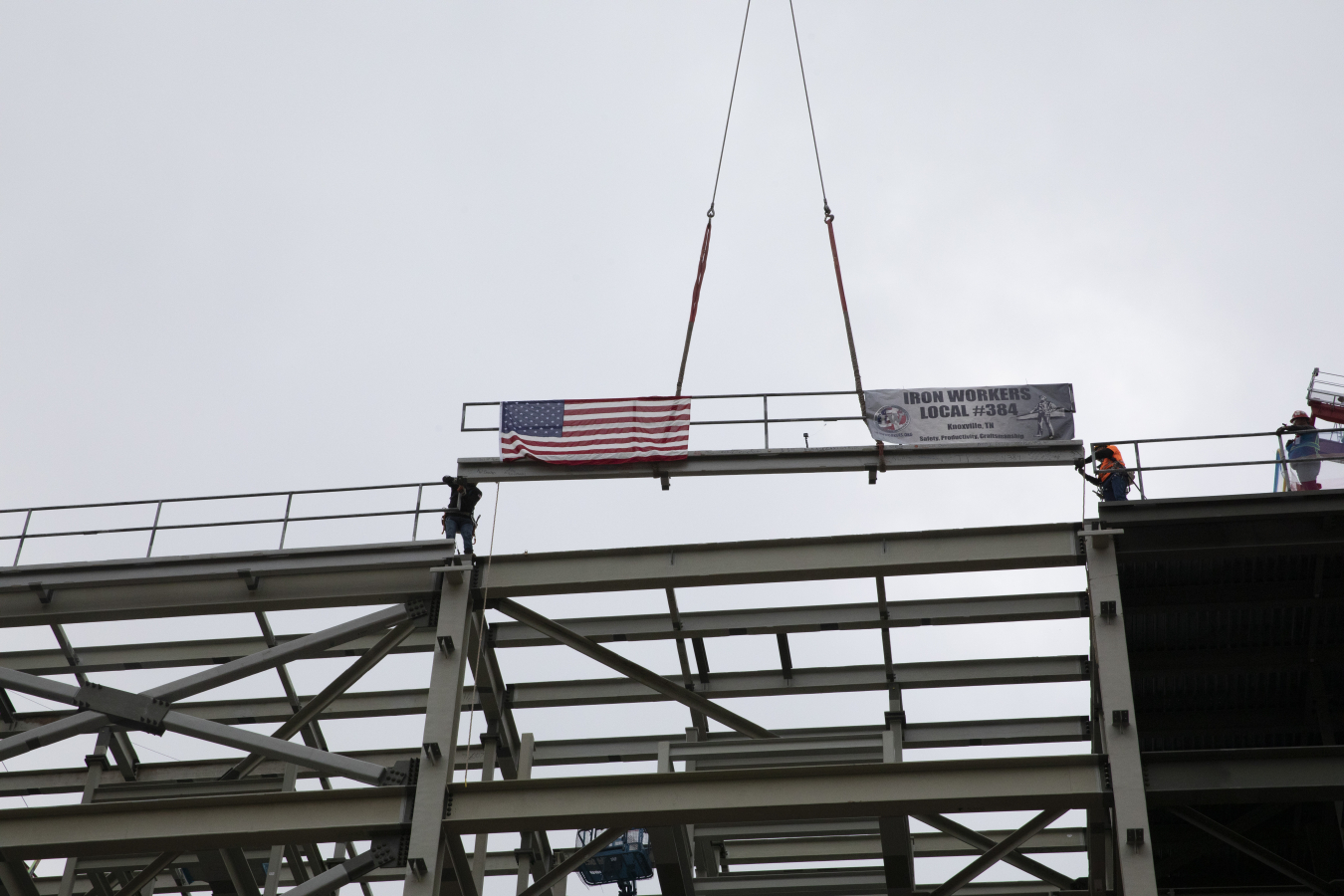 The UPF Project places the last piece of structural steel on the Salvage and Accountability Building (SAB) during an Oct. 26 “topping out” ceremony.