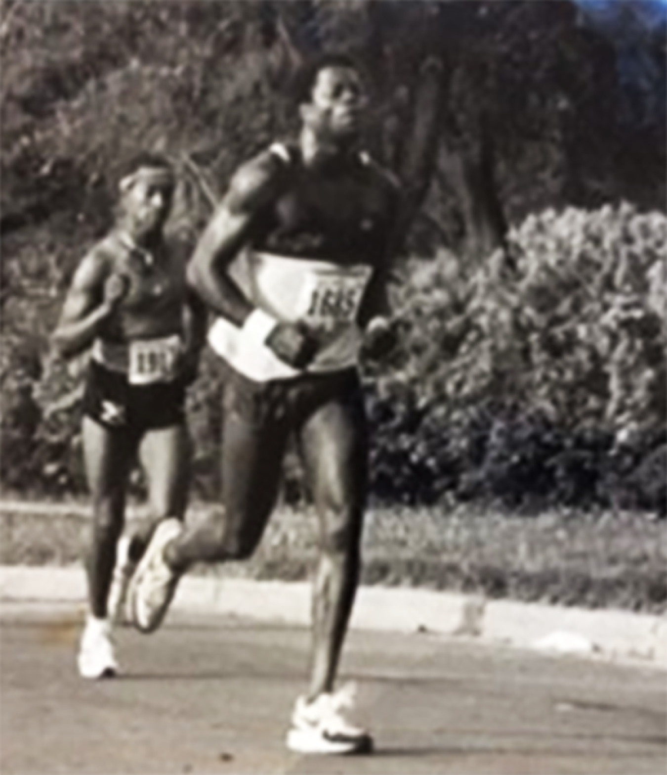 NNSA employee Cheran Shields (left) running in a marathon.