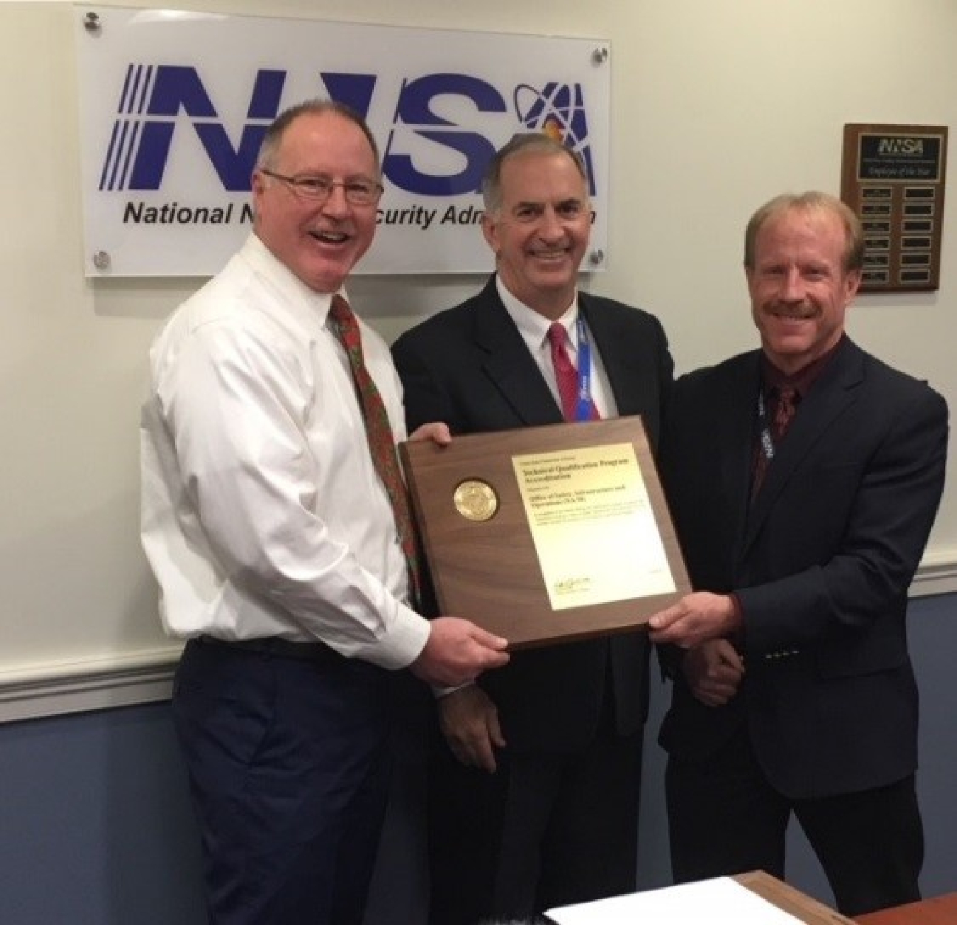 NNSA achieved Technical Qualification Program Accreditation in 2020. From left, NNSA's James McConnell; Matthew Moury, DOE Associate Under Secretary for Environment, Health, Safety and Security; and Jeffry Roberson, Senior Technical Adviser.