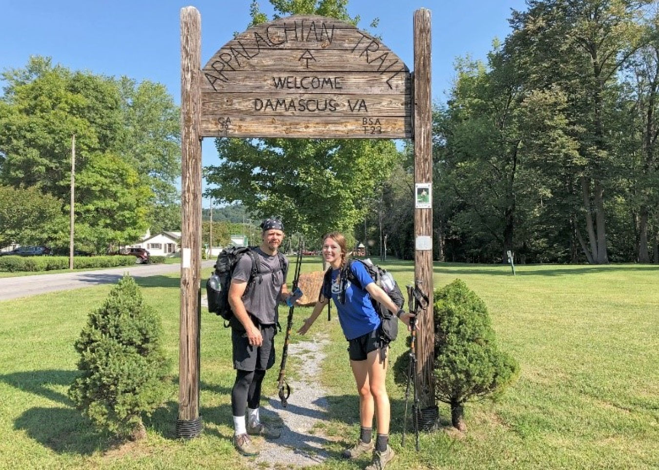 NNSA SRFO Classification Officer Bob Houck (left) and his daughter Reagan after arriving in Damascus, Virginia, in September 2020 having section hiked the Georgia, North Carolina, and Tennessee portions of the Appalachian Trail together.