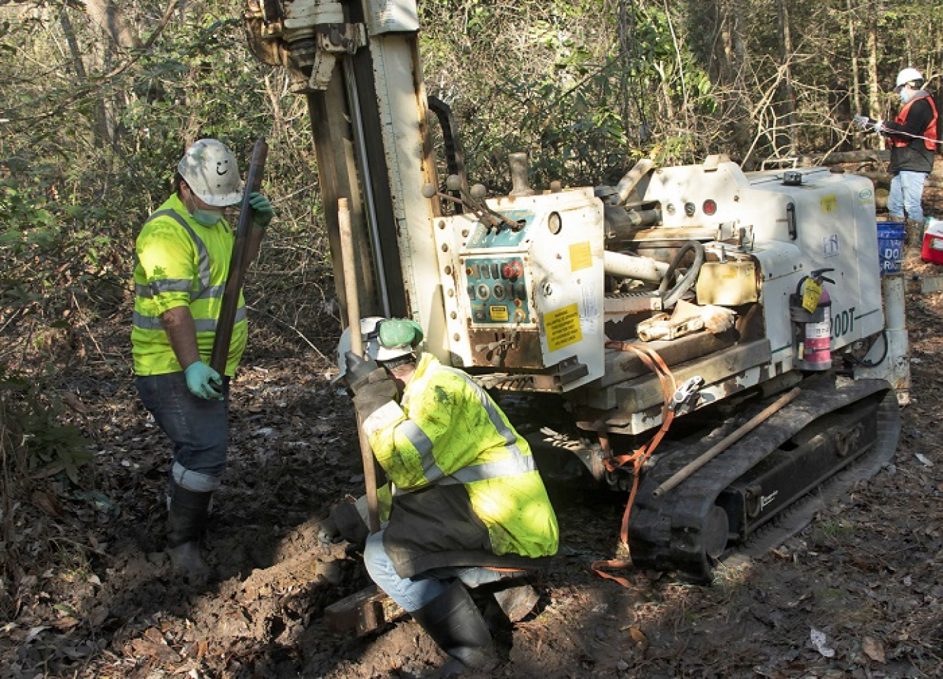 Savannah River Nuclear Solutions subcontractors drill for soil samples as part of a project to immobilize iodine-129 in the groundwater and soil at the Savannah River Site. Pictured are Donald Miles and Richard Mooney with Cascade Drilling Company.