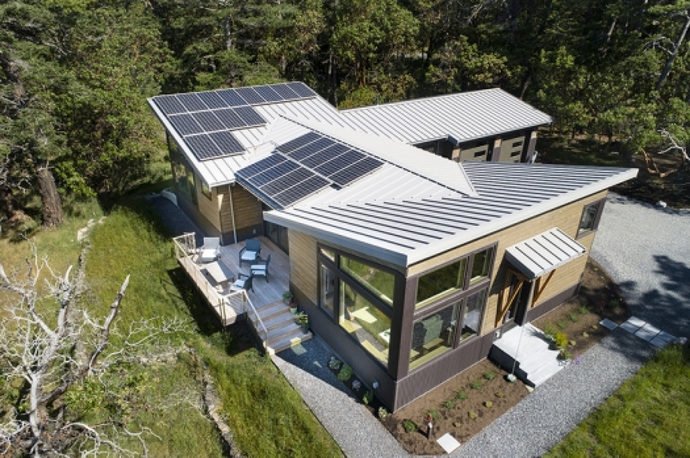 An ariel view of U.S. DOE 2020 Zero Energy Ready Home Housing Innovation Award winning home “La Pedrera Net Zero Residence” by Bellingham Bay Builders in Friday Harbor, WA