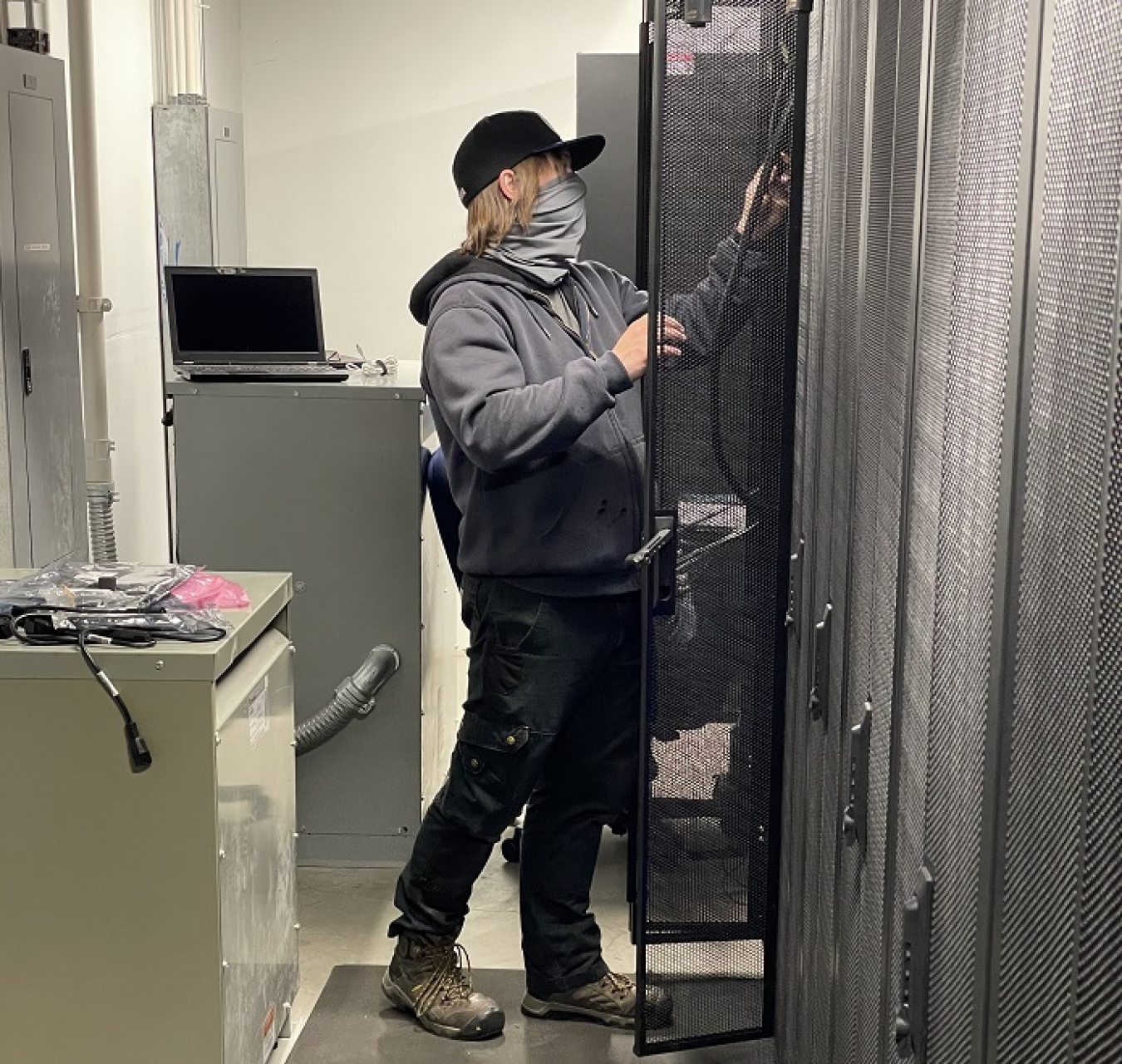 Information technology field support specialist Chris Martin takes part in a disaster recovery exercise on the Hanford Site, which tested critical systems and upgraded data storage capacity.