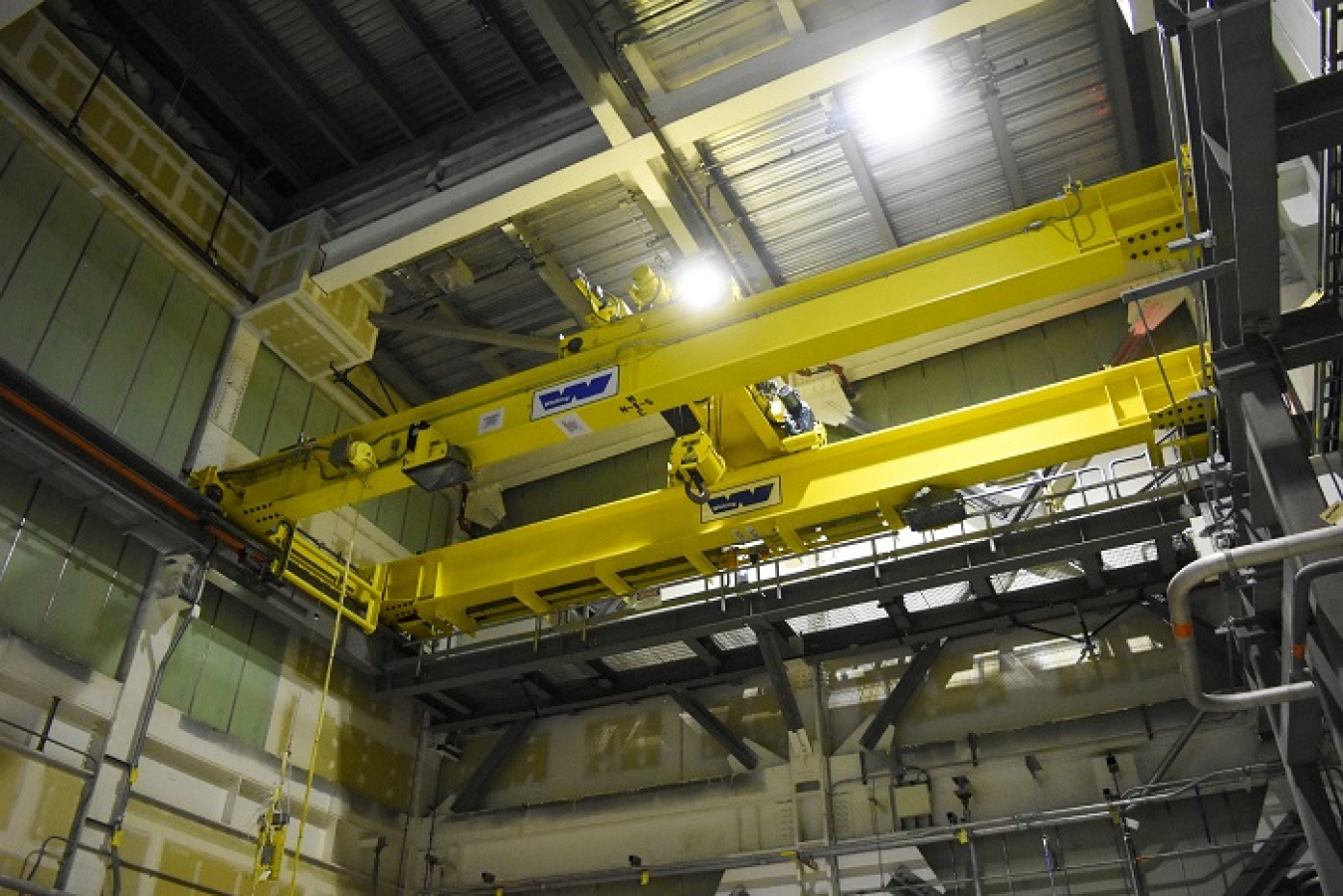 The Hanford Waste Treatment and Immobilization Plant recently completed the first commissioning test inside the Low-Activity Waste Facility. The test demonstrated this bridge crane in the process cell area can successfully perform all required tasks.