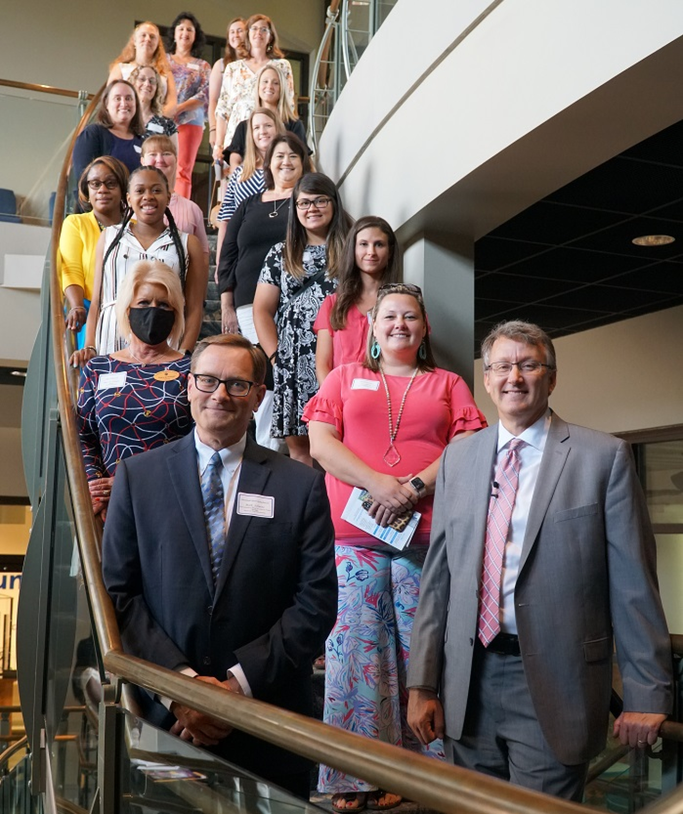 The 2021 SRR STAR grants totaled over $15,000 to help advance science, technology, engineering, and math (STEM) curriculum in elementary school classrooms. Most of the teachers who won grants are pictured here behind Breidenbach and Schmitz.