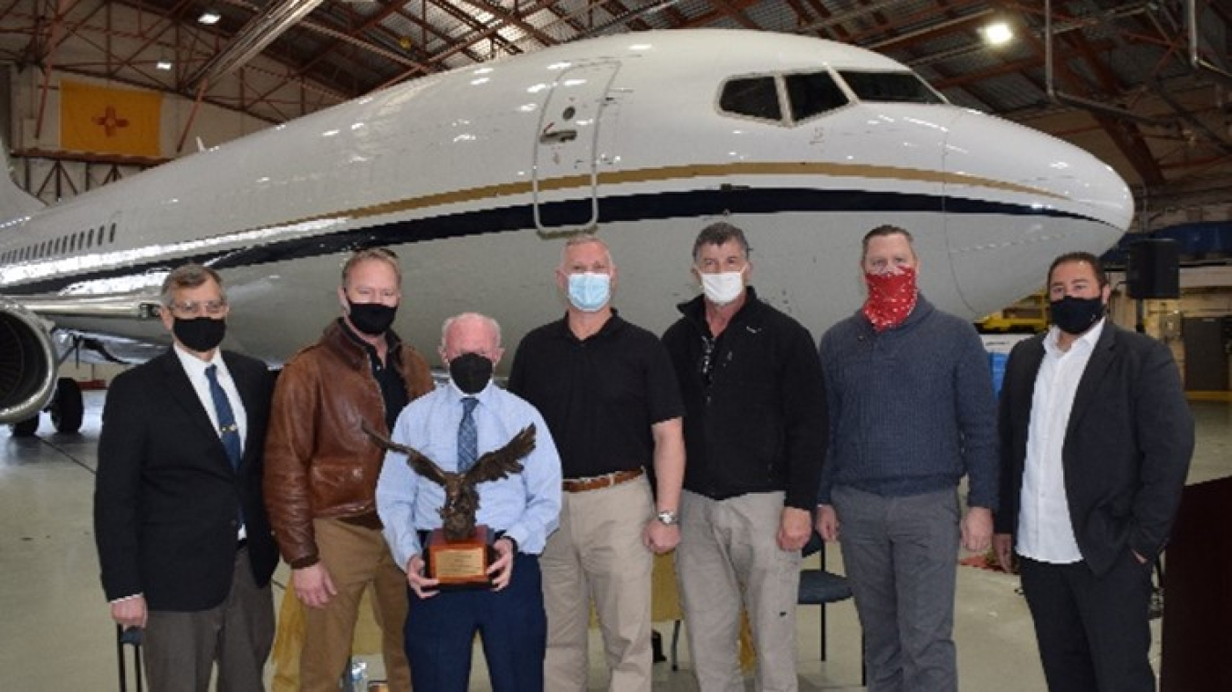 NNSA's Office of Secure Transportation's Aviation Operations Division Director Alex Bapty, left, with a group of OST pilots and staff.