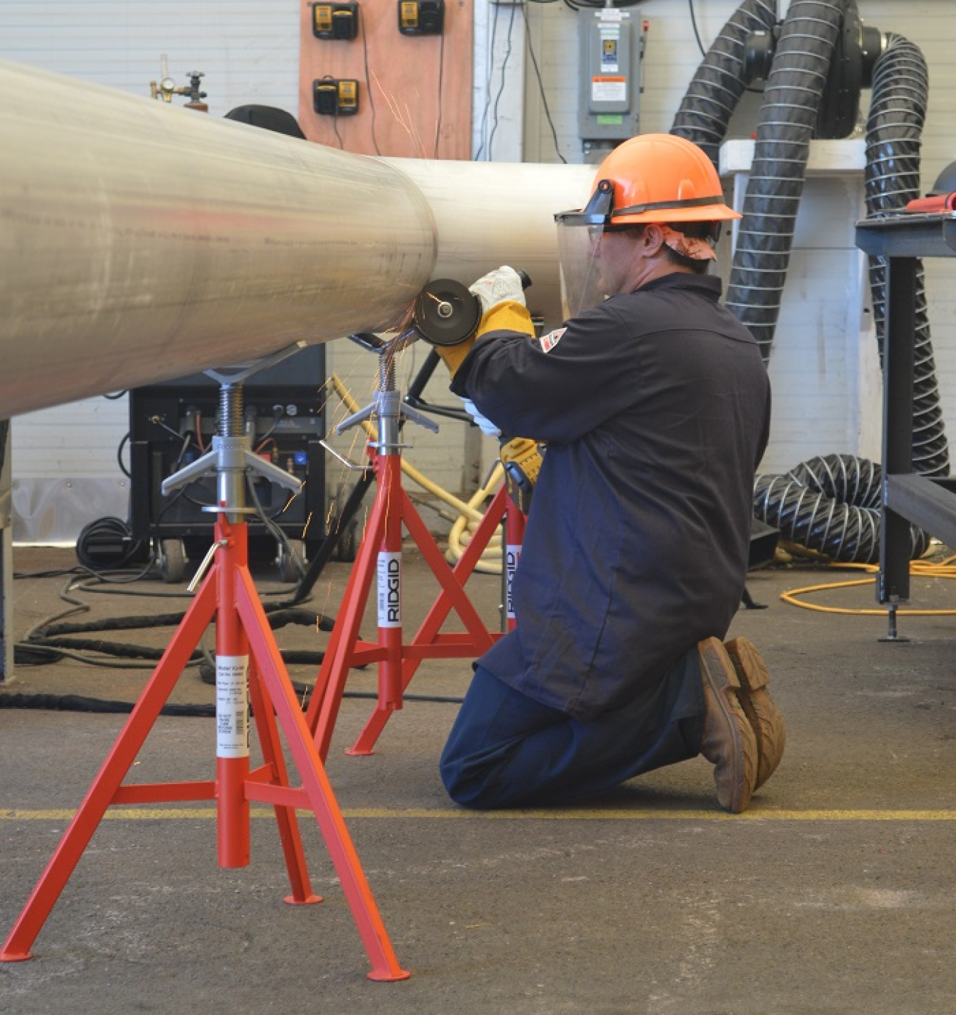 A North America's Building Trades Unions employee helps fabricate piping for upgrades to the Molten Salt Reactor Experiment facility at Oak Ridge National Laboratory.