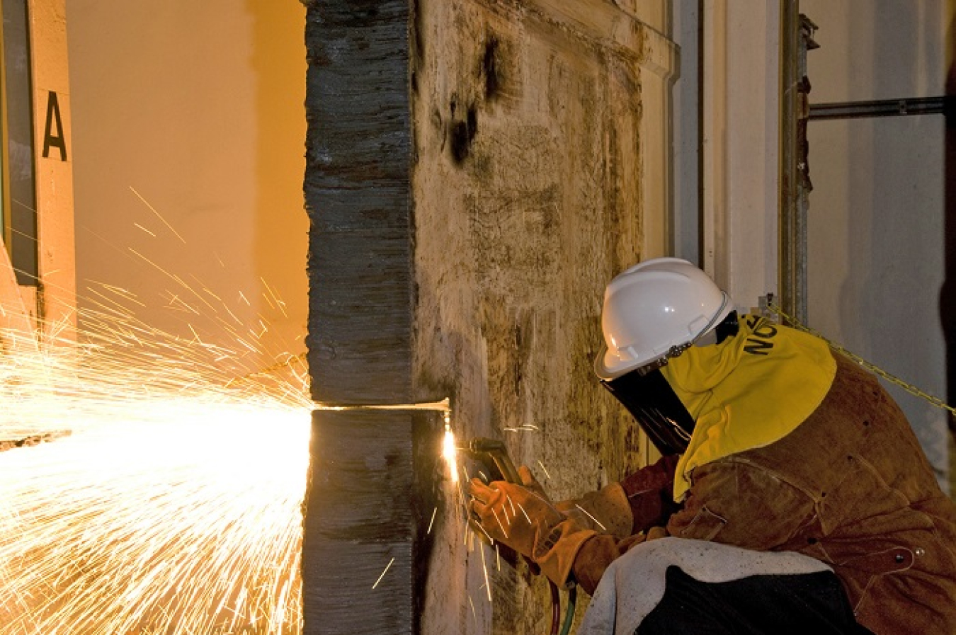 Thick steel doors within P and R Reactor buildings at the Savannah River Site were removed prior to filling the facilities with concrete-like grout. The doors formerly shielded workers from a room containing a nuclear process vessel. EM finished decommissioning the buildings in 2011.