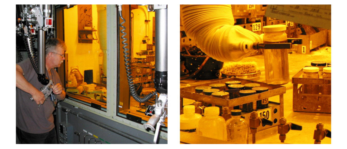 A Wastren Advantage, Inc. worker remotely handles tank waste samples through a hot cell in the 222-S Laboratory at the Hanford Site.