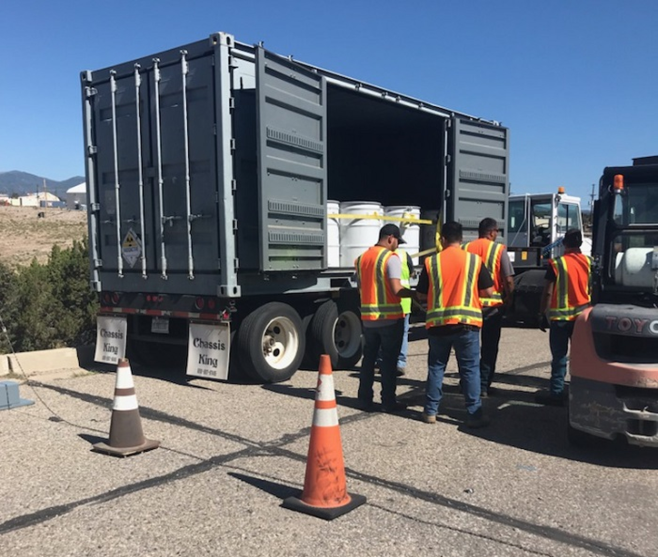 A crew with Newport News Nuclear BWXT-Los Alamos, the cleanup contractor for the EM Los Alamos Field Office (EM-LA), prepares EM-LA's 30th transuranic waste shipment of fiscal 2021 in Area G at Technical Area 54.