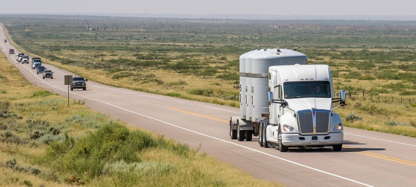 A shipment of transuranic waste approaches EM’s Waste Isolation Pilot Plant (WIPP) on the WIPP North Access Road. To date, almost 13,000 shipments have been safely transported to WIPP, and its drivers have traveled more than 15 million safe loaded miles.