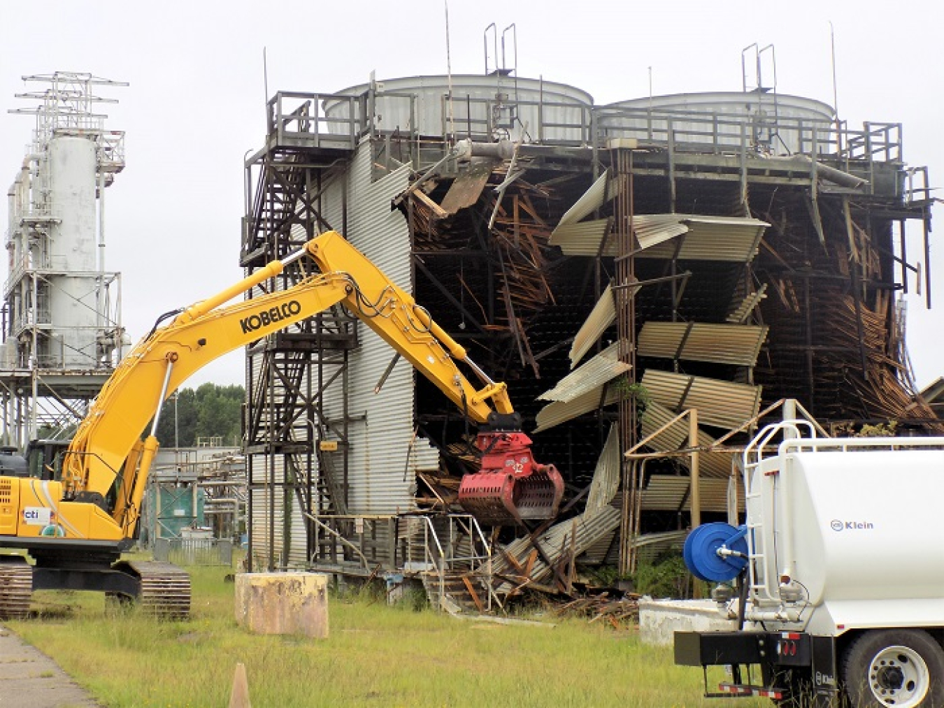 EM workers demolish a large industrial cooling tower built in 1952 at the Savannah River Site.