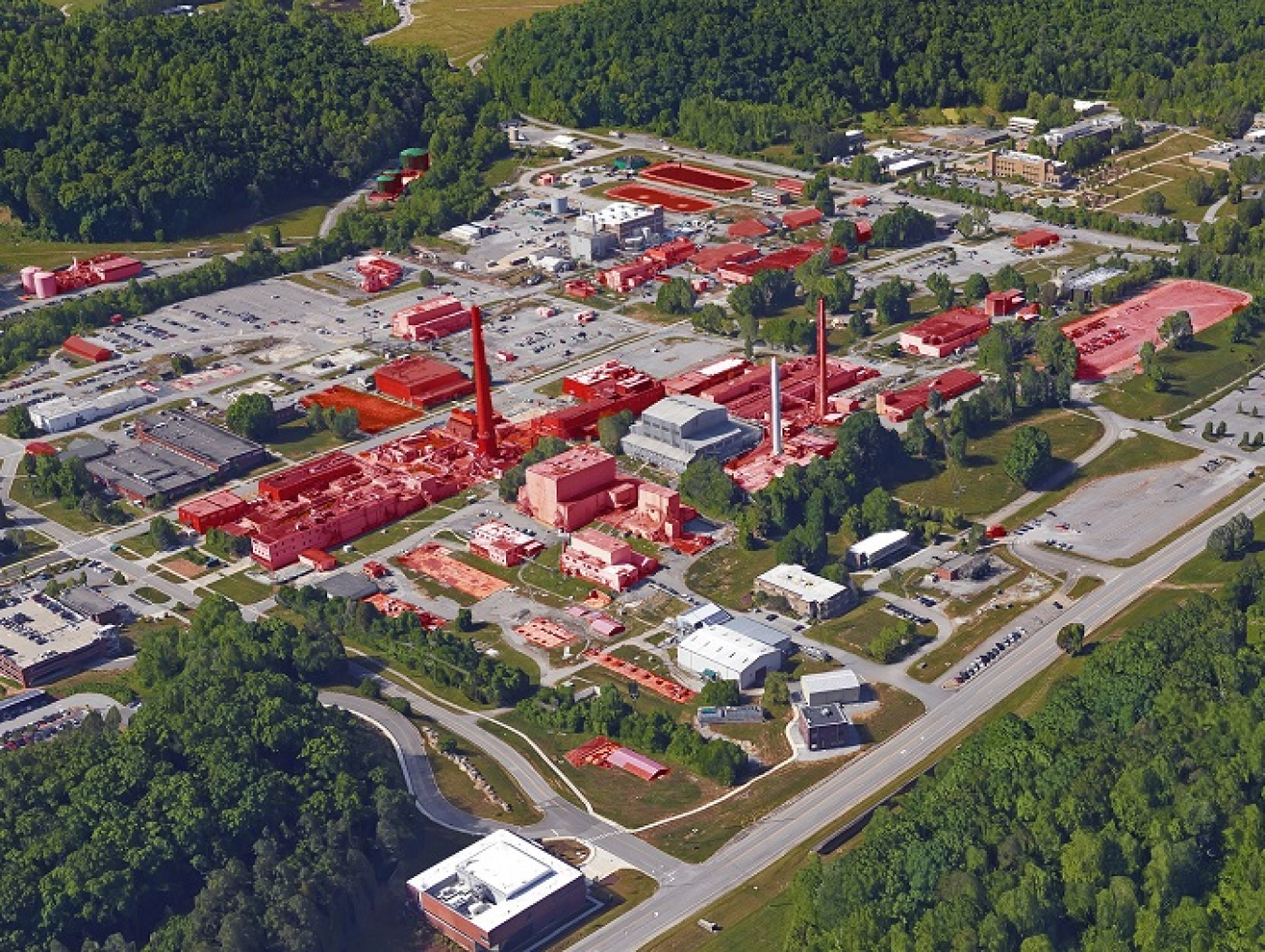 A view of the central campus area at Oak Ridge National Laboratory (ORNL), which houses the oldest buildings at the laboratory. Buildings slated for EM cleanup are highlighted in red. Crews are performing deactivation at 18 ORNL facilities.