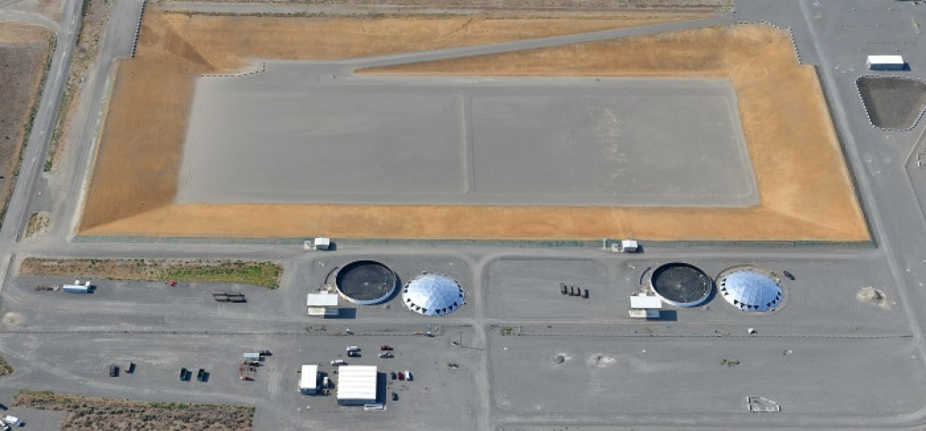 In coming months, crews at the Hanford Site will install domes on the Integrated Disposal Facility’s two leachate tanks. EM contractor Central Plateau Cleanup Company is completing construction on the engineered landfill for safe, permanent disposal of vitrified low-activity tank waste from the Waste Treatment and Immobilization Plant.