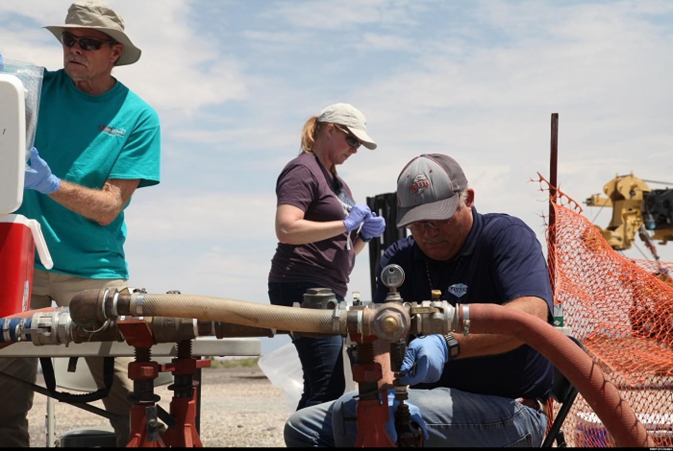 Employees with Navarro Research & Engineering, the EM Nevada Program's environmental program services contractor, are shown at work at the Nevada National Security Site prior to the COVID-19 pandemic. Navarro recently achieved 3.5 million hours without a lost workday due to a safety incident.