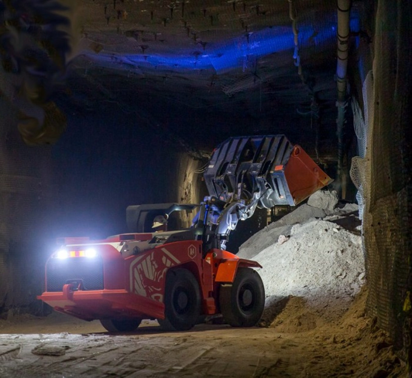 A battery powered load-haul-dump loader moves mined salt in the EM Waste Isolation Pilot Plant underground. Increasing the use of electric vehicles is among EM actions to support the Administration’s executive orders on climate change policy. 