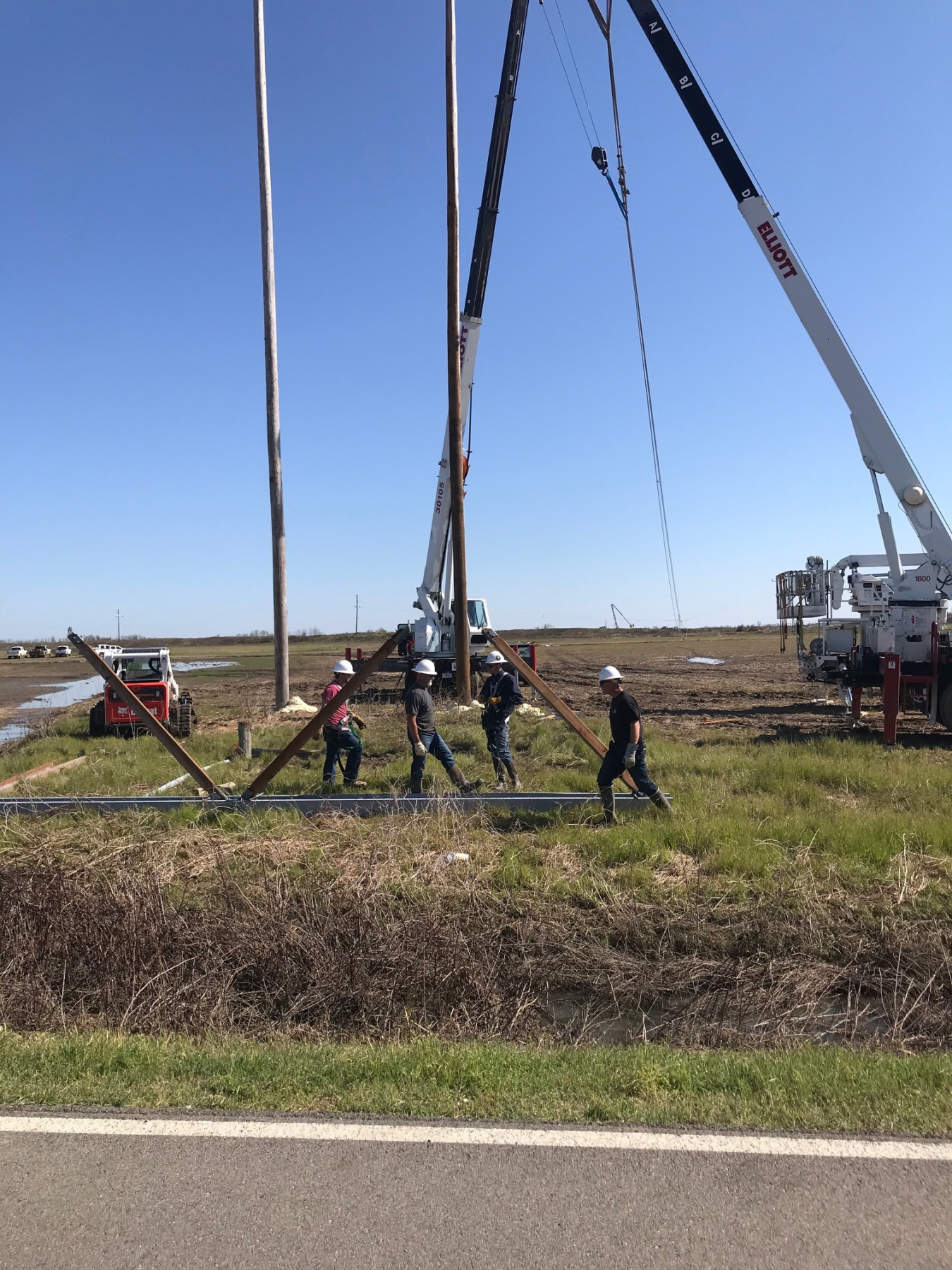 Southwestern Construction crews followed in the path of crews responsible for wrecking out debris and crews responsible for staging new equipment, making the restoration of the line a true team effort.