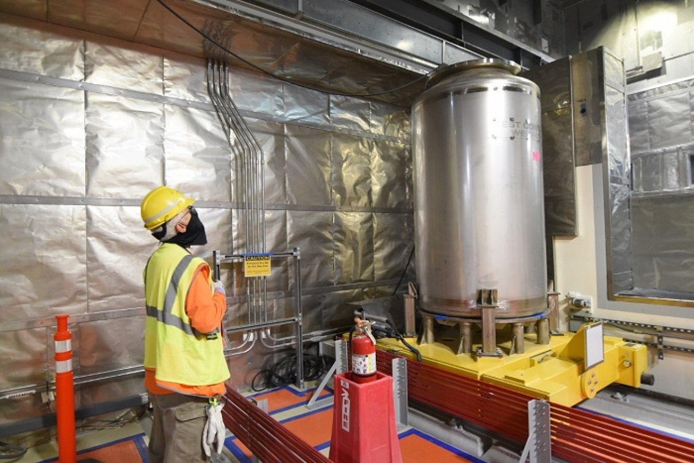 Electrician Ralph Bisla conducts tests of the finishing line inside the Low-Activity Waste Facility at Hanford’s Waste Treatment and Immobilization Plant.