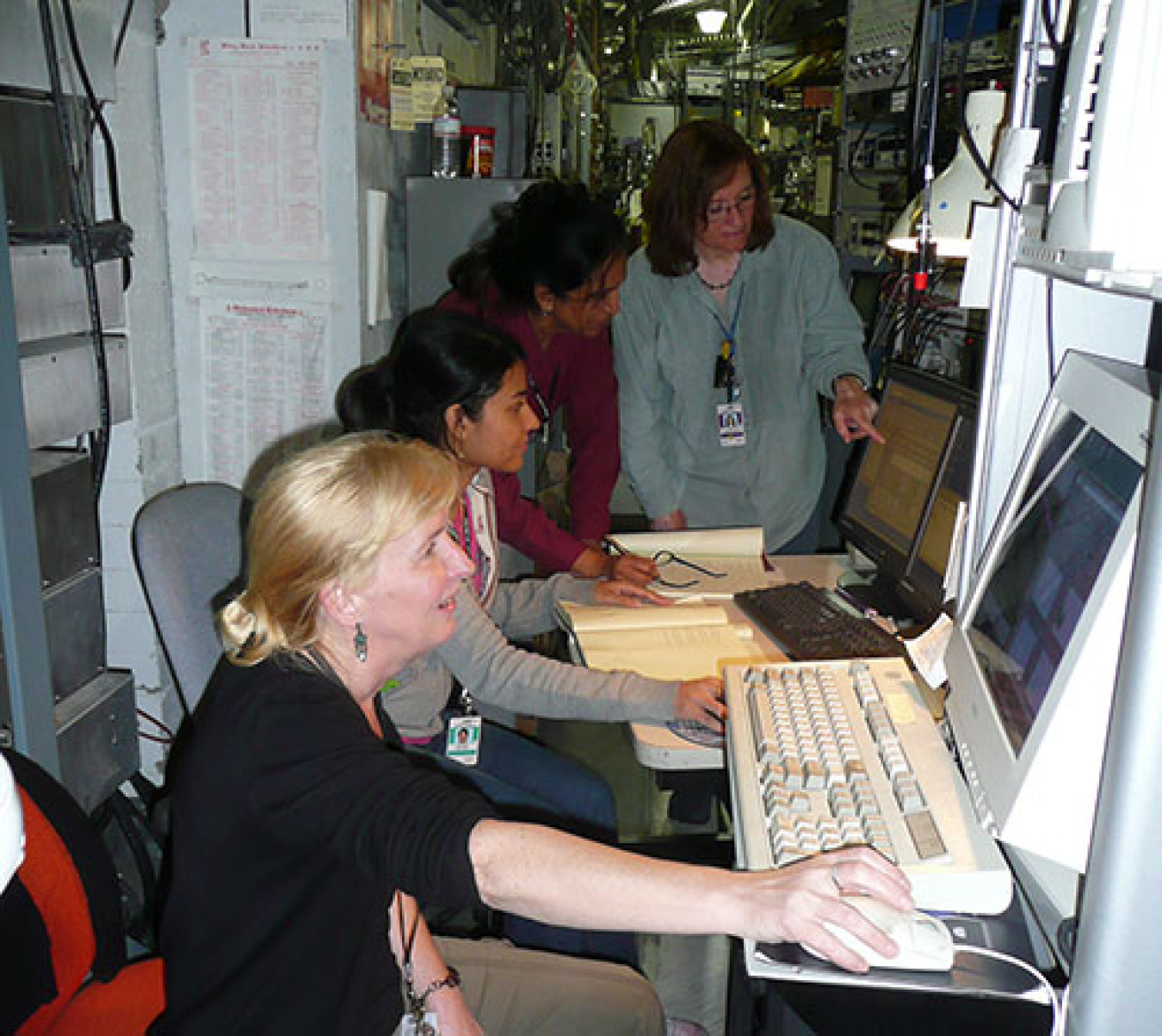 Jean Jordan-Sweet (in the back) with three other researchers shown here taking data at the X20C beamline at NSLS.