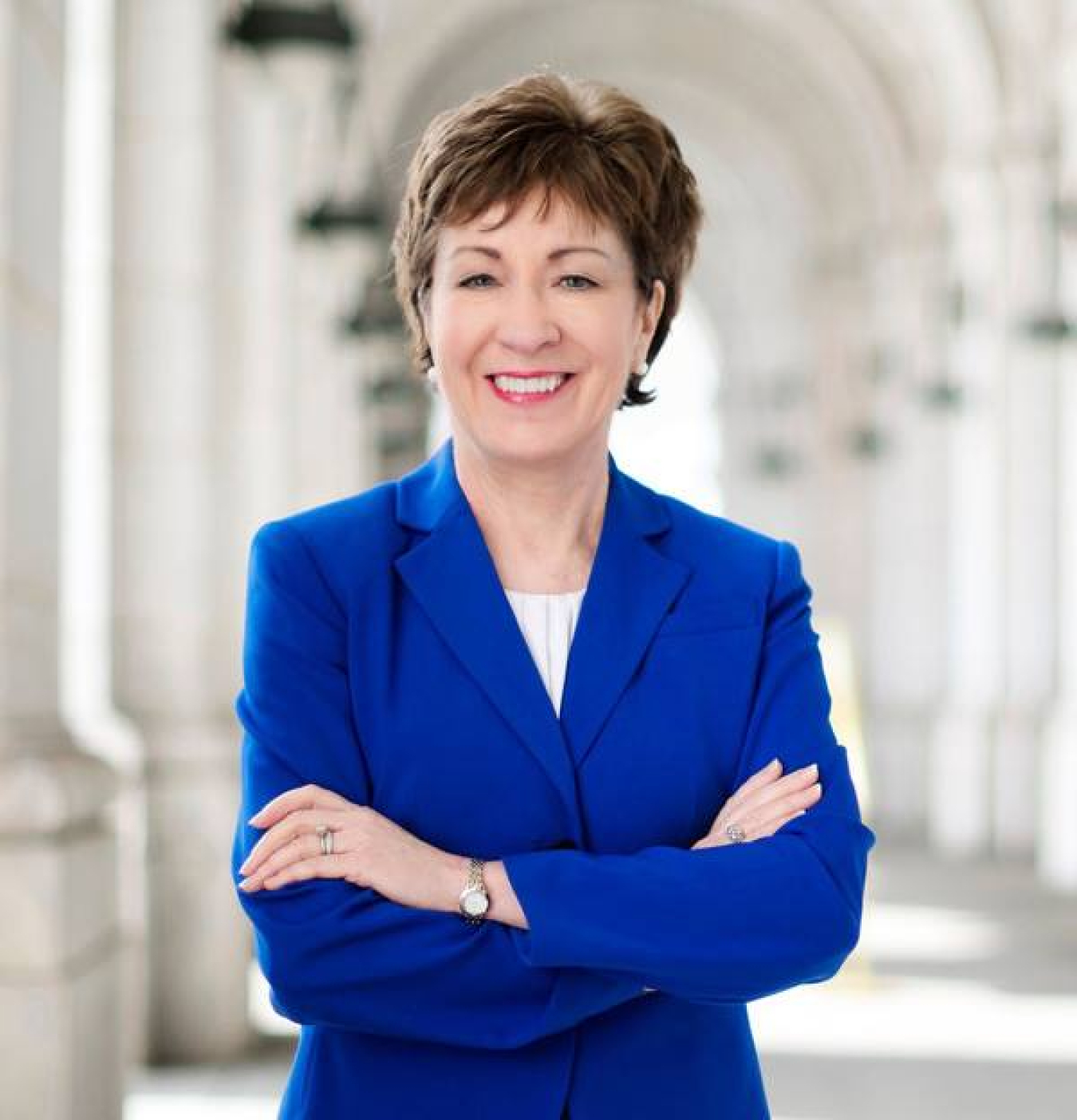 senator Susan Collins in blue suit